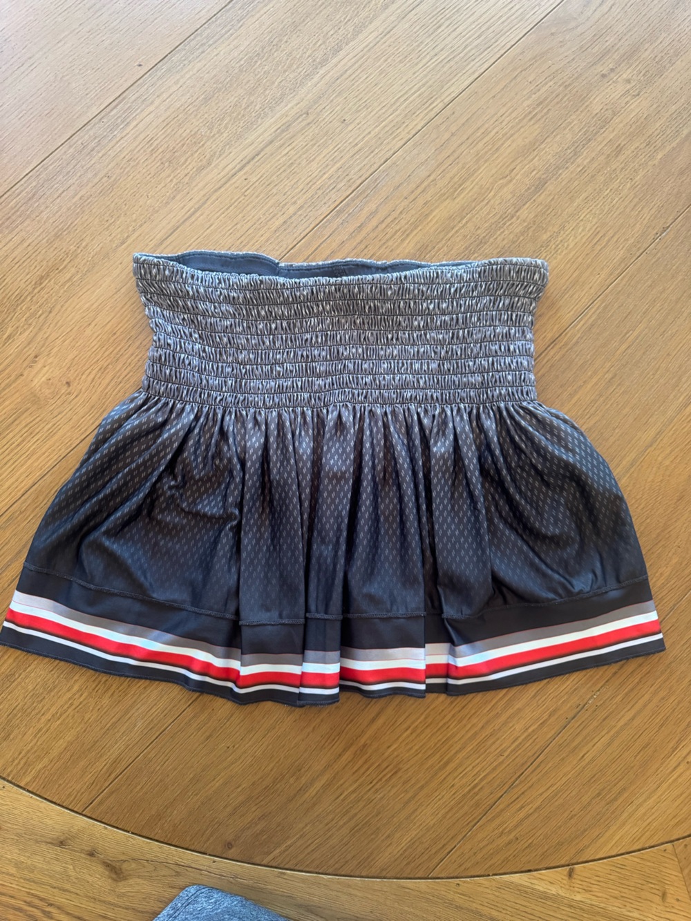 Lucky in Love Black Smocked Skater Skirt with Red and White Hem Stripes